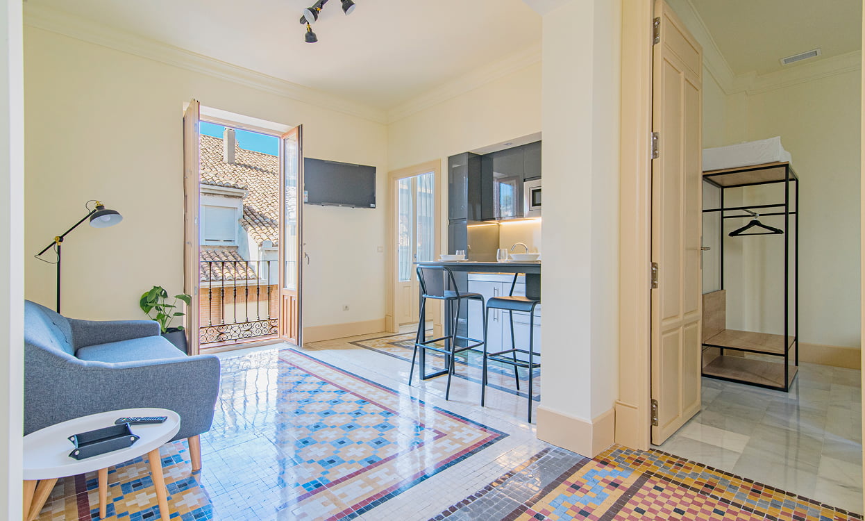 Apartamento con cocina con barra americana